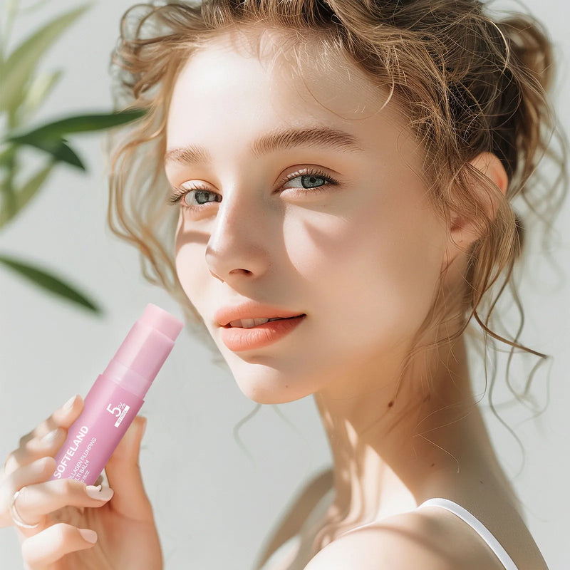 Model holding Pink Collagen Balm